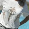 T-shirt blanc palmiers beiges